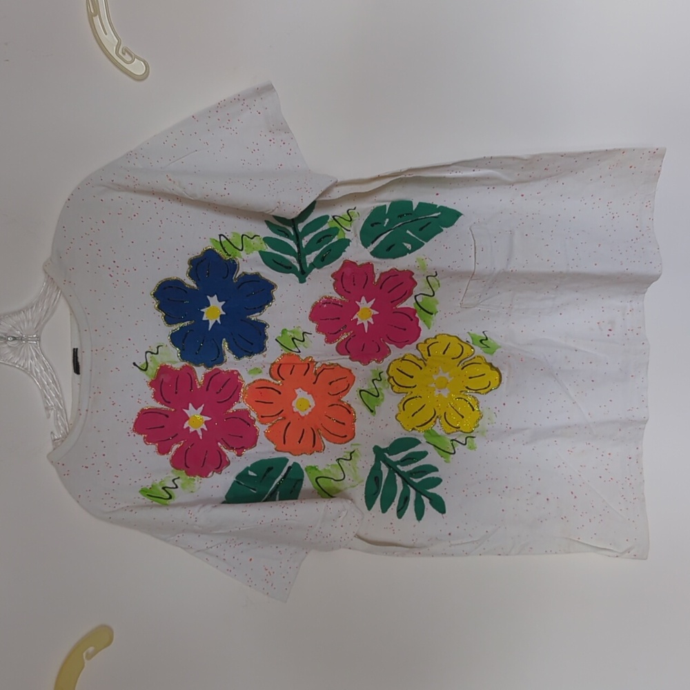 LG flower tee shirt with lower left frontal pocket